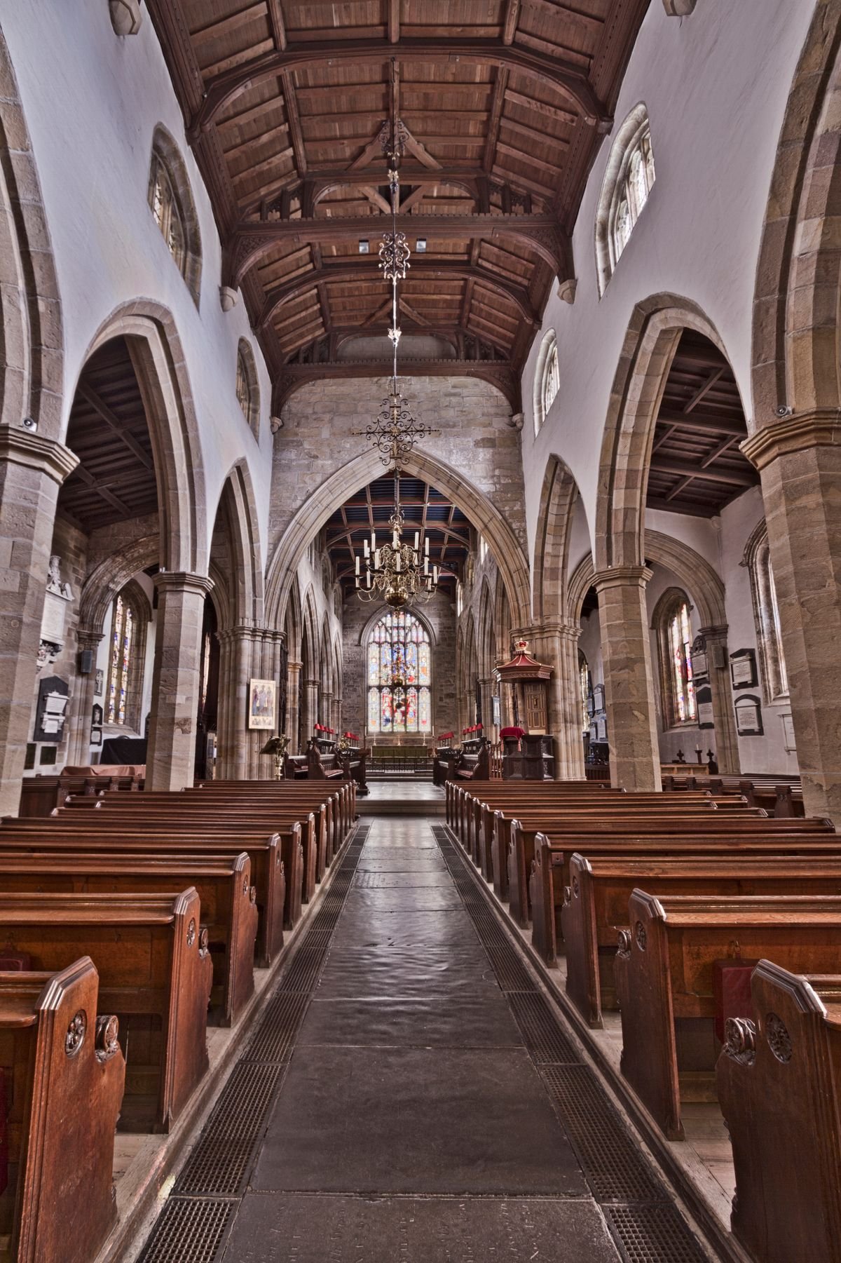 Clean church interior with pews and stained glass